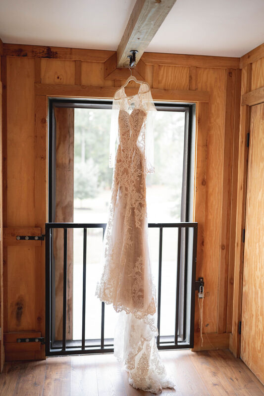 Dress, Hanging Dress, Wedding Dress Details, Exposed Wood, Wedding Day Photography, Balcony, White Dress, Lace Dress, Knot Too Shabby Events, Wilmington Wedding Planner, NC Wedding Planner, Wedding Details, Dress Details, The Barn at Rock Creek, 