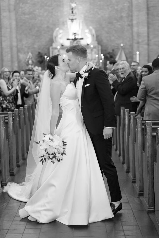 Just Married, Bride and Groom, Husband and Wife, Kiss Down the Aisle, Ceremony Recessional, Black and White Photography, Wedding Day Photography, White Strapless Wedding Dress, Wedding Veil, Bridal Bouquet, Black Suit, Black Bow Tie, Indoor Ceremony, Basilica of St. Mary, Church Wedding, Catholic Wedding, Knot Too Shabby Events, Wilmington Wedding Planner, NC Wedding Planer, 