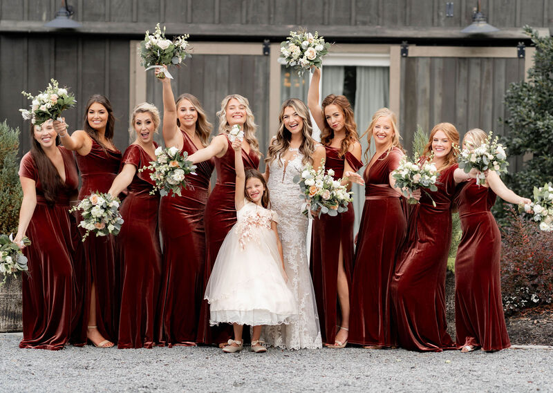 Bride, Bridesmaids, Velvet Red Bridesmaids Dresses, Velvet Burgundy Bridesmaids Dresses, Bridesmaids Bouquets, White Roses, Blush Roses, Greenery, Flower Girl, White Flower Girl Dress, Flower Crown, Celebrating, Wedding Dress, White Dress, Lace Dress, Outdoor Venue, Wedding Day Photography, Bridal Party, Knot Too Shabby Events, Wilmington Wedding Planner, NC Wedding Planner, 