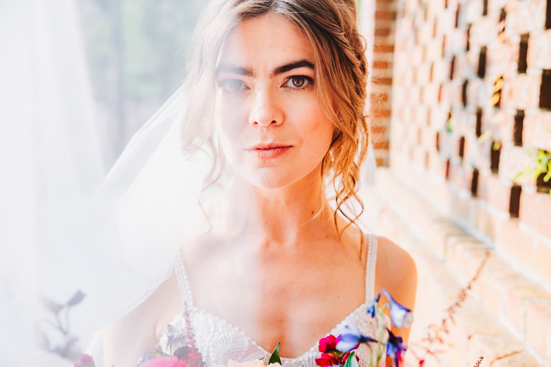 Bridal Portrait, Close-up of Bride, White Dress, Wedding Dress, Veil Photo, Intimate Close-up, Hint of Flowers, Detailed Brick Background, Wedding Day Photography, Knot Too Shabby Events, Wilmington Wedding Planner, North Carolina Wedding Planner, 